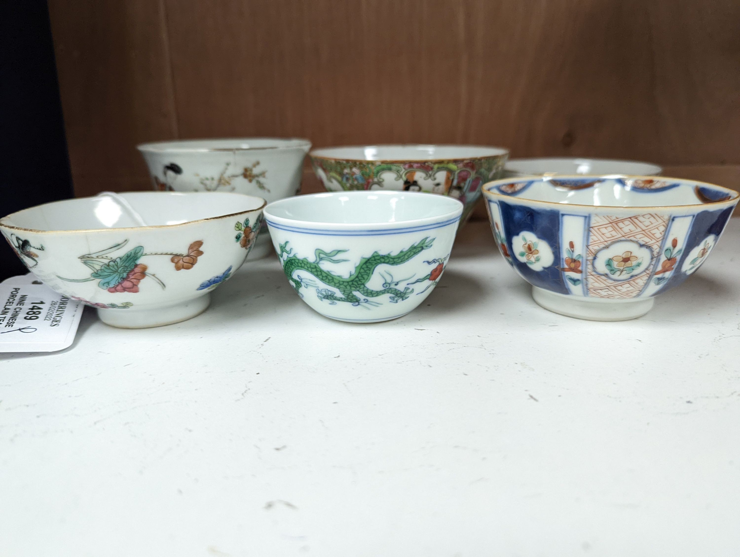 Nine Chinese porcelain tea bowls, tallest 6 cm.